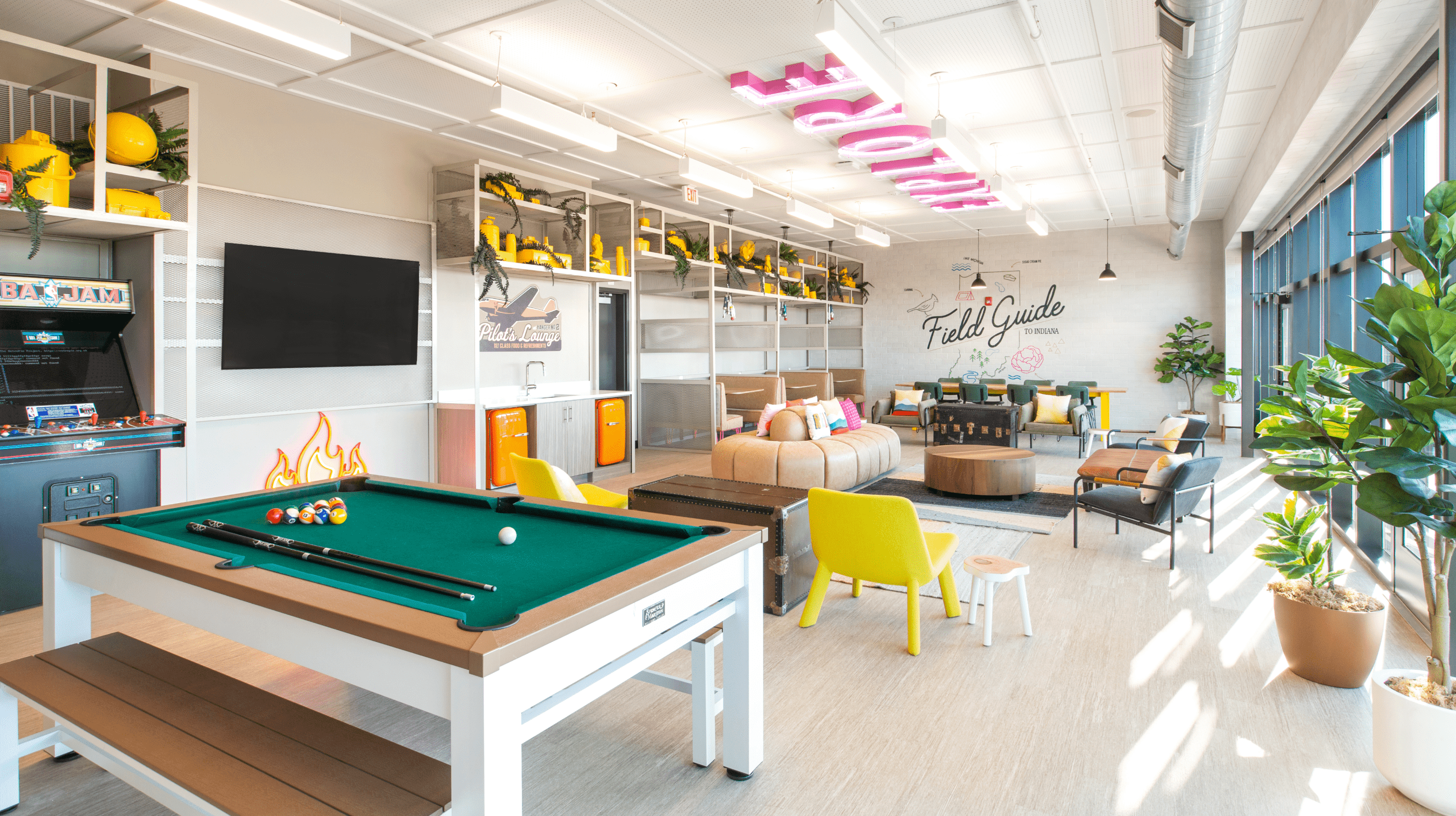 A common area with pool tables