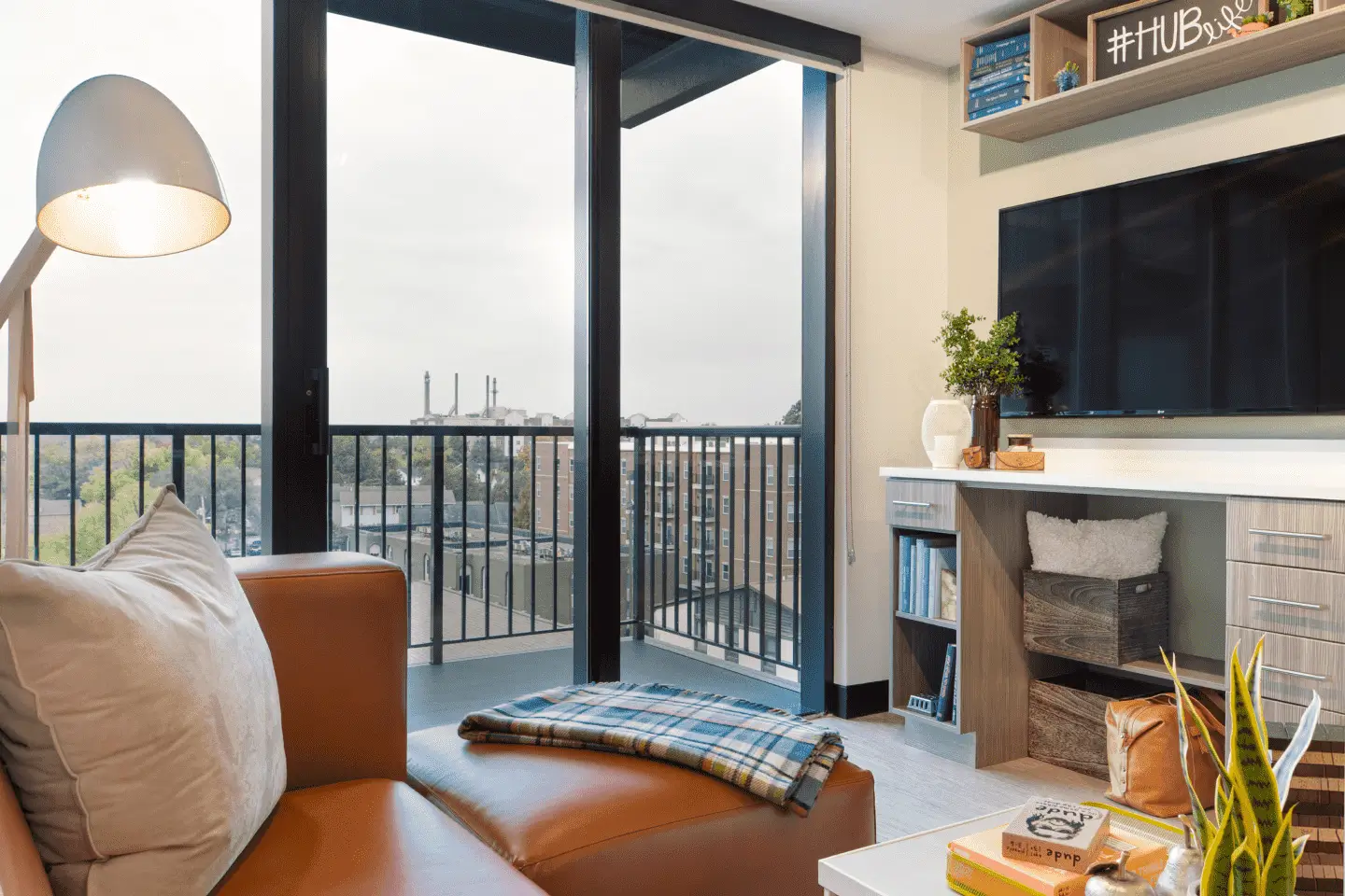 furnished apartment living room with a TV